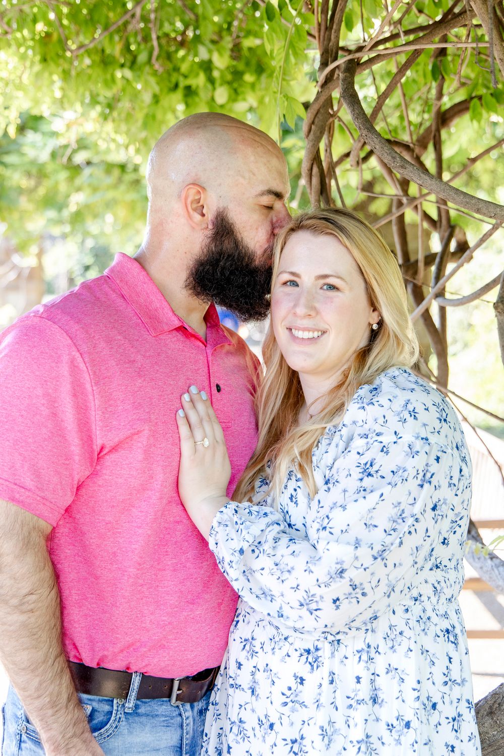 Couple walking with their dogs during Austin and Fort Worth engagement session