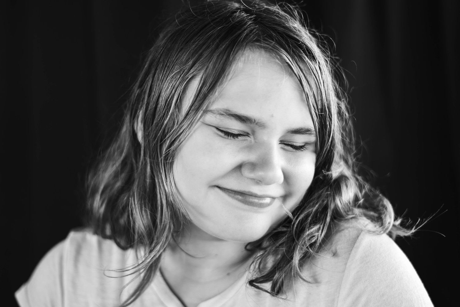 School age girl giggling during a family session in palm bay florida