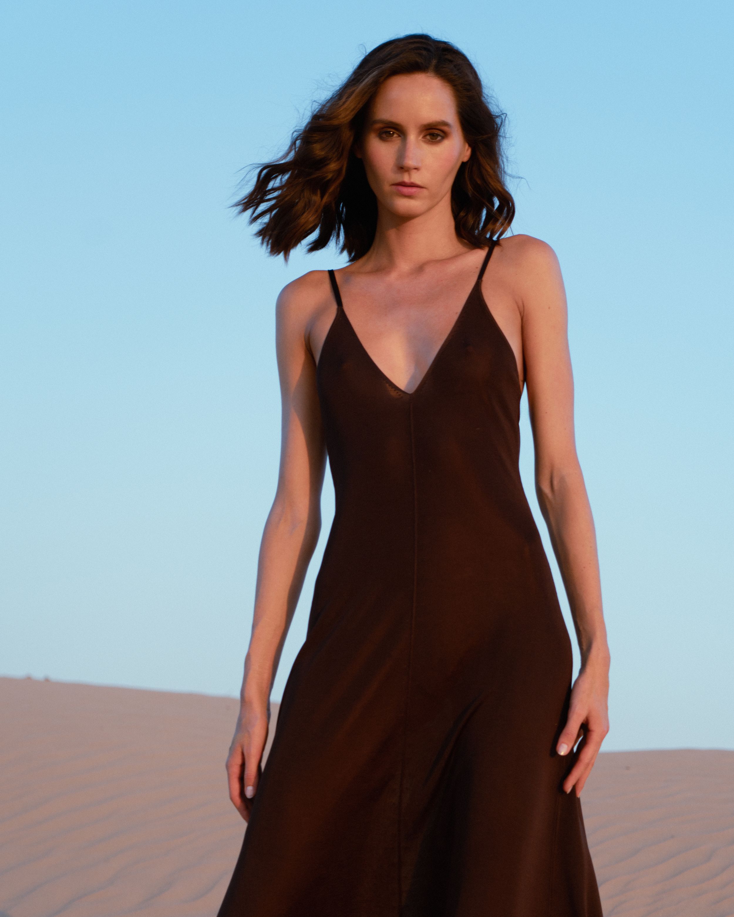 Fashion editorial featuring a model in a desert.