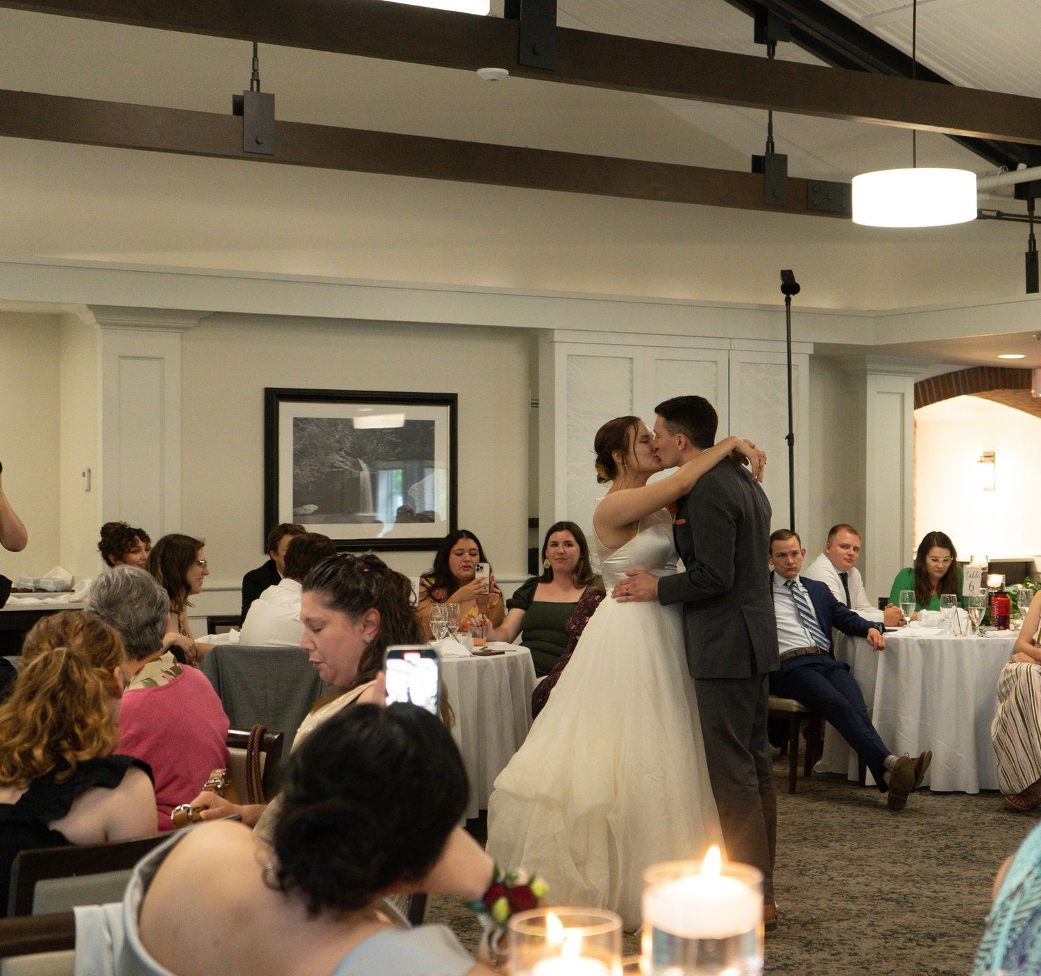 Columbus Ohio Wedding Venues Indoor wedding reception with guests dancing and celebrating on the dance floor.