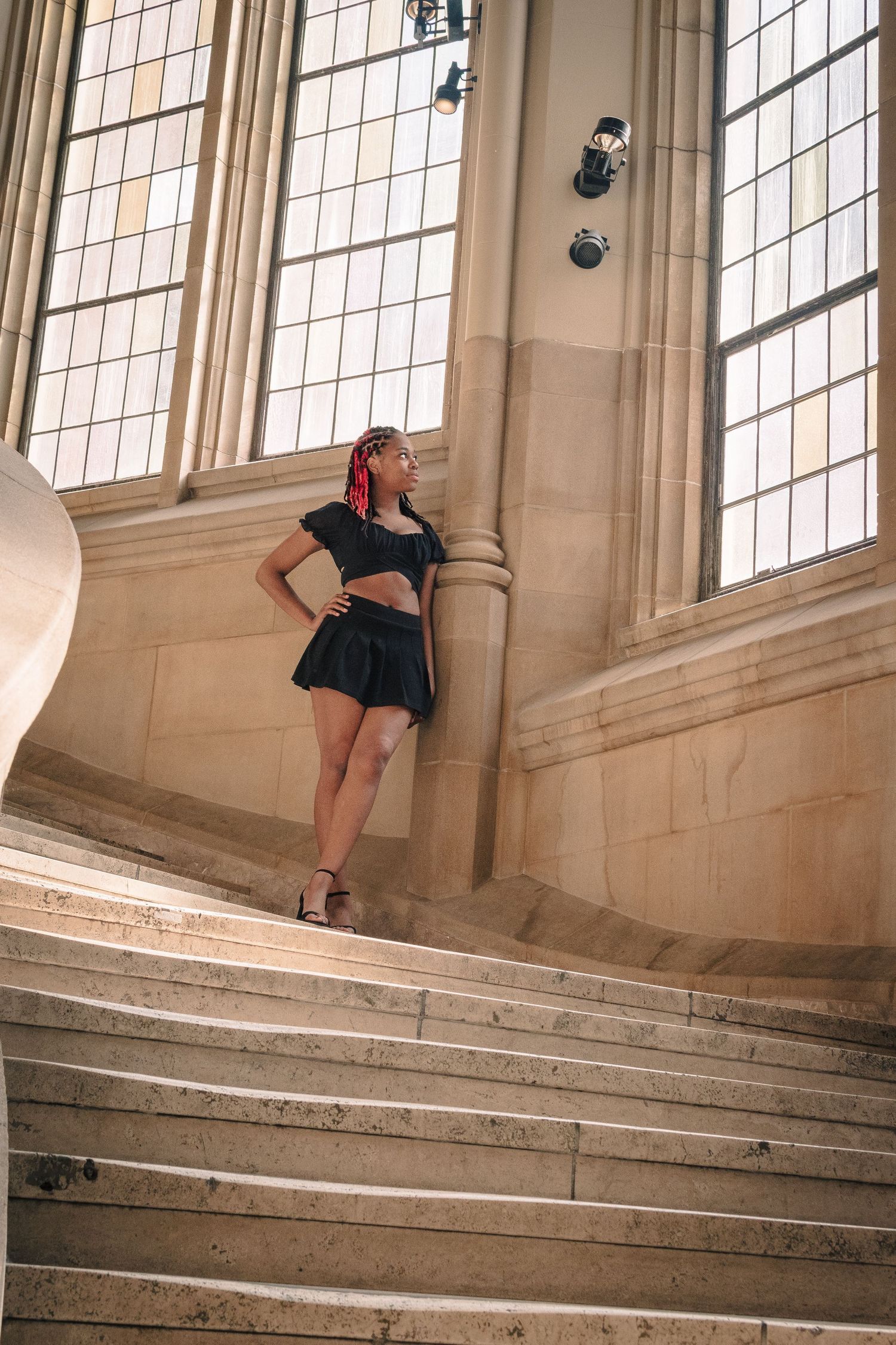 Senior photo at Suzzallo Library staircase University of Washington Seattle