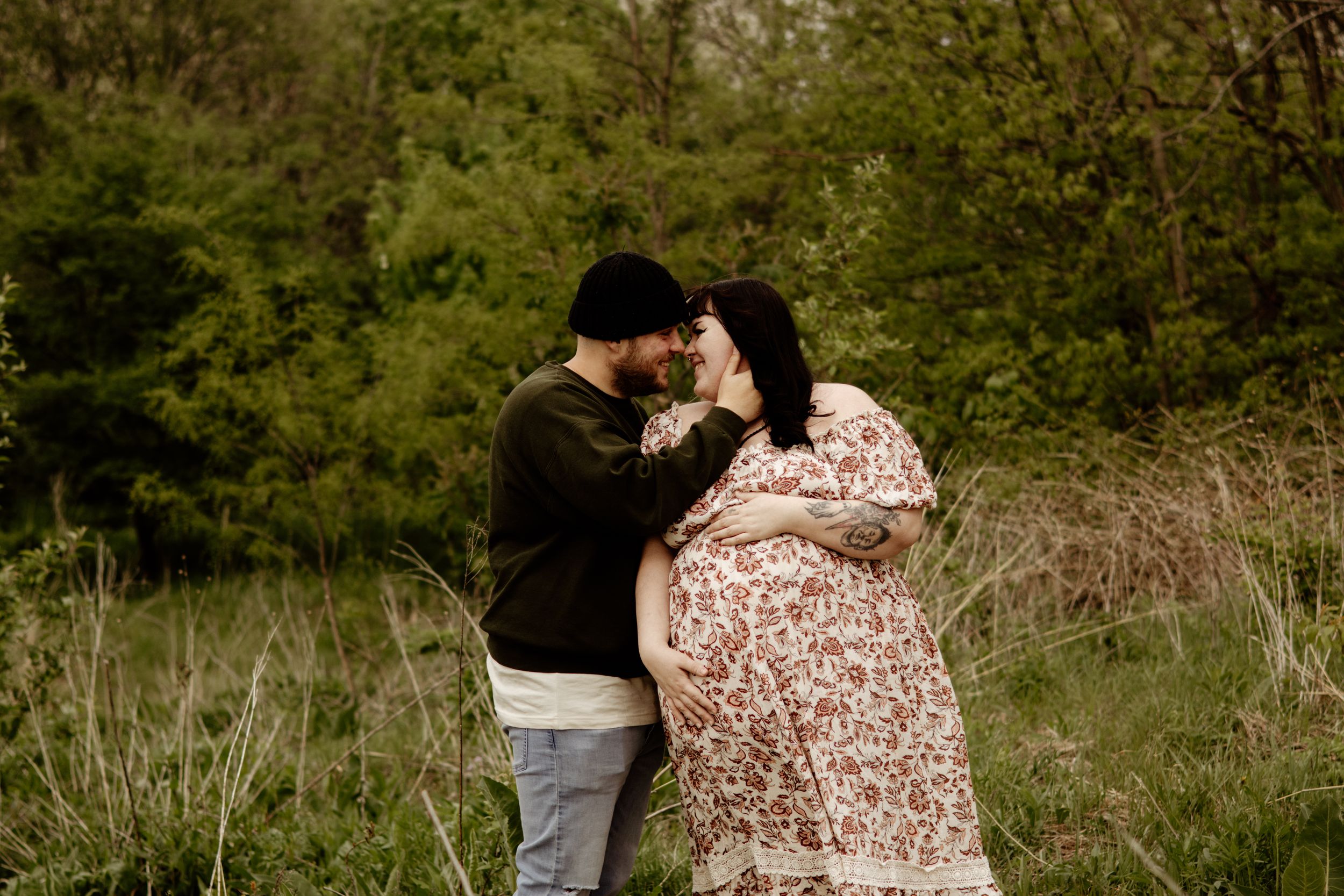 A young expecting couple.