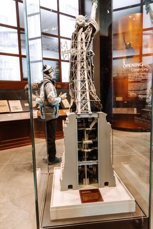 Museum exhibit displaying architectural models and construction history of a historic landmark.