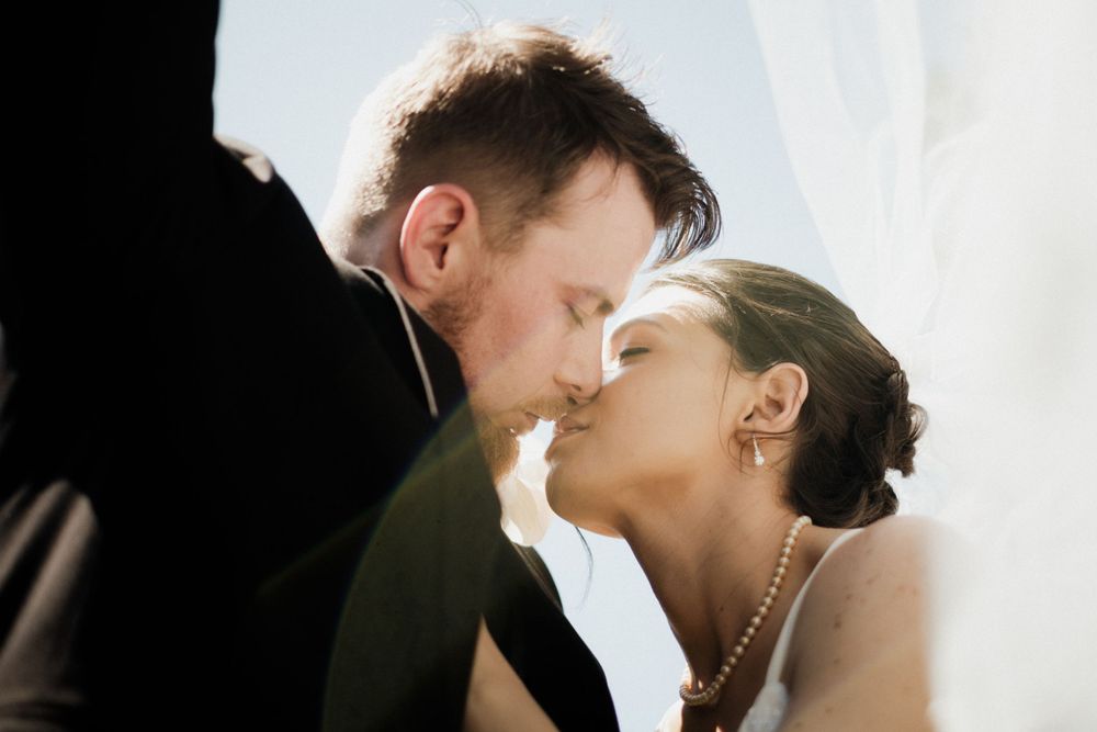 Romantic wedding photography sequence showing tender moments in soft light.