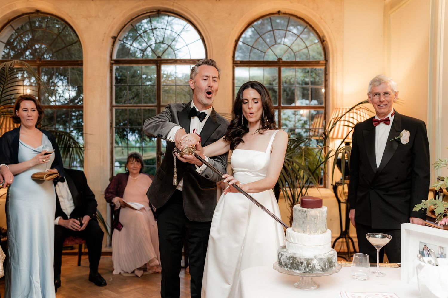 horsham Surrey wedding with Italian theme cake cut