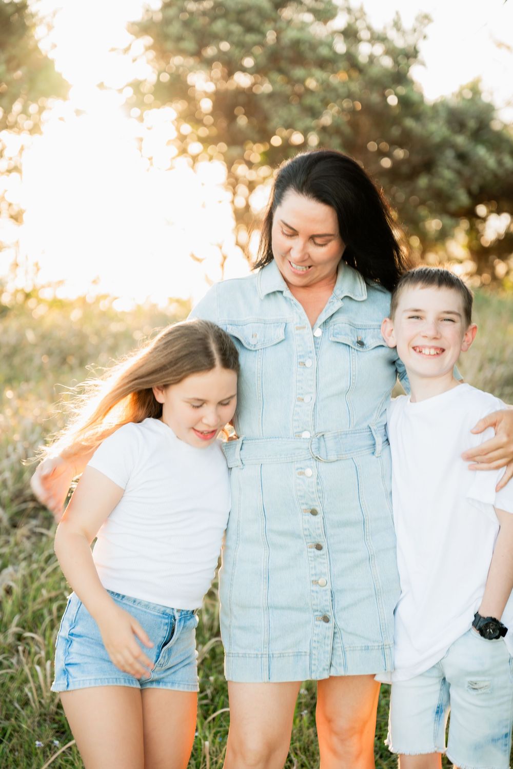 Everyday parenting moment – relaxed family branding photo of mum and daughter walking together in natural light.