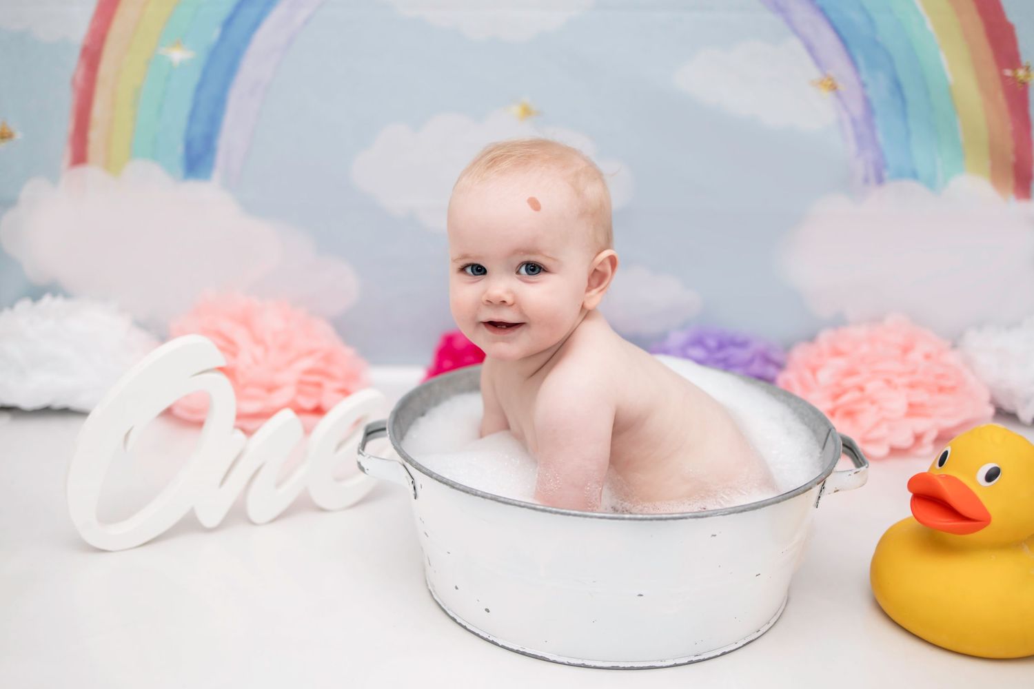 baby girl cake smash and splash in the tub rainbow theme Tameside photographer photography