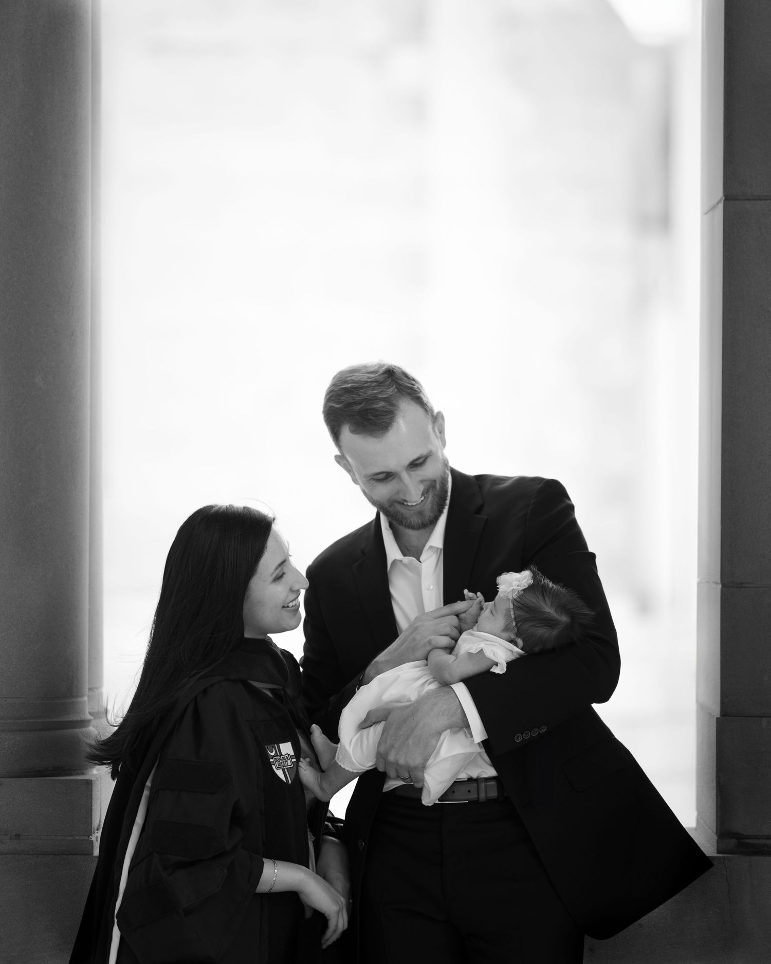 Black and white portrait session between classical columns.
