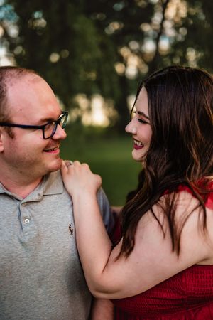 A romantic series of candid photos showing a couple laughing and embracing outdoors at sunset.