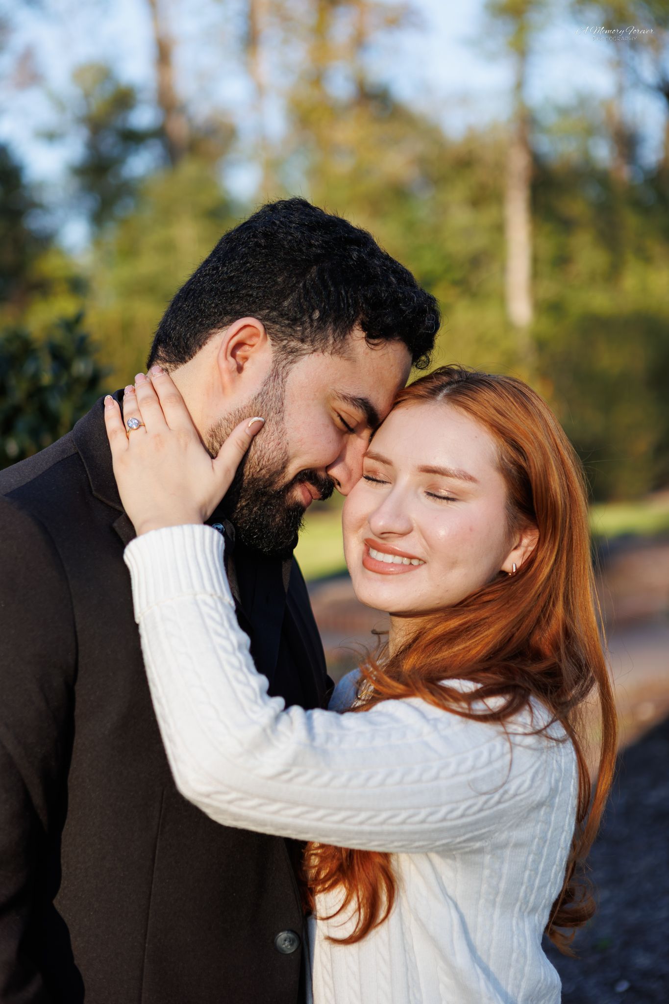 Two hands gently exchanging a ring, symbolizing engagement or commitment, with a brown leather bracelet visible.