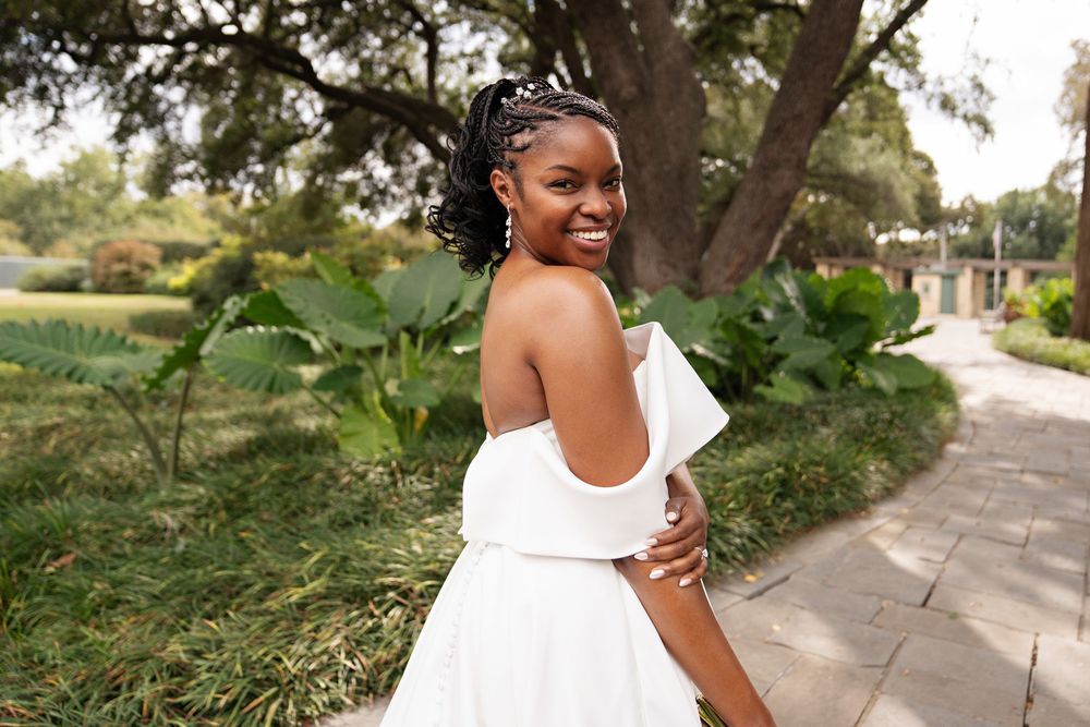 bride in wedding dress making eye contact