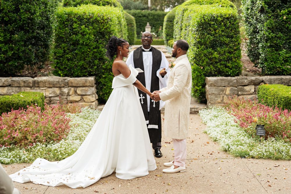 bride and groom at altar in outdoor setting