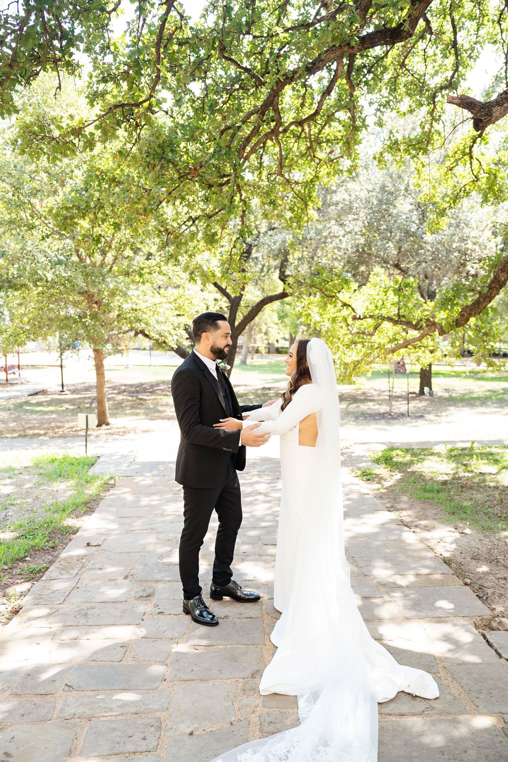bride and groom facing each other