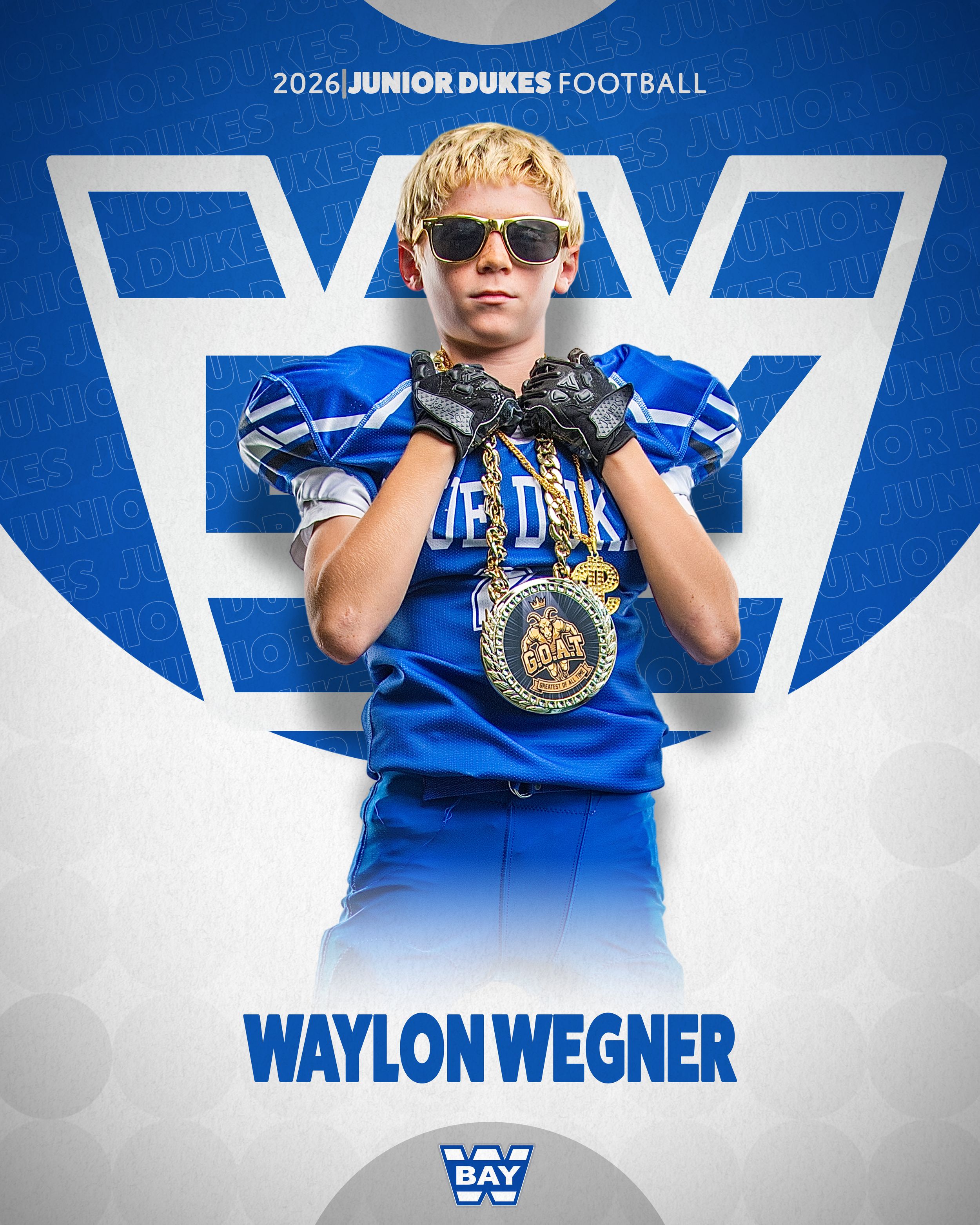 Waylon Wegner in blue Junior Dukes Football uniform poses confidently wearing sunglasses and a championship medal for 2026 season.