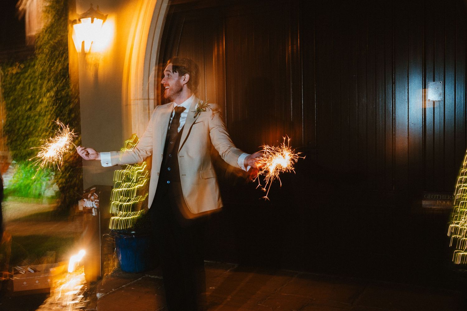 Creative long-exposure sparkler portrait of the bride and groom at BrookLodge.