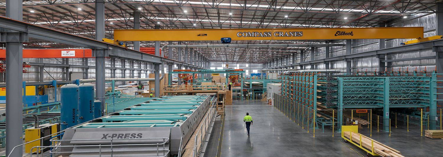 Wodonga Commercial Image of a worker walking in a workshop with a Crane, captured by Jason from JRP Studio.