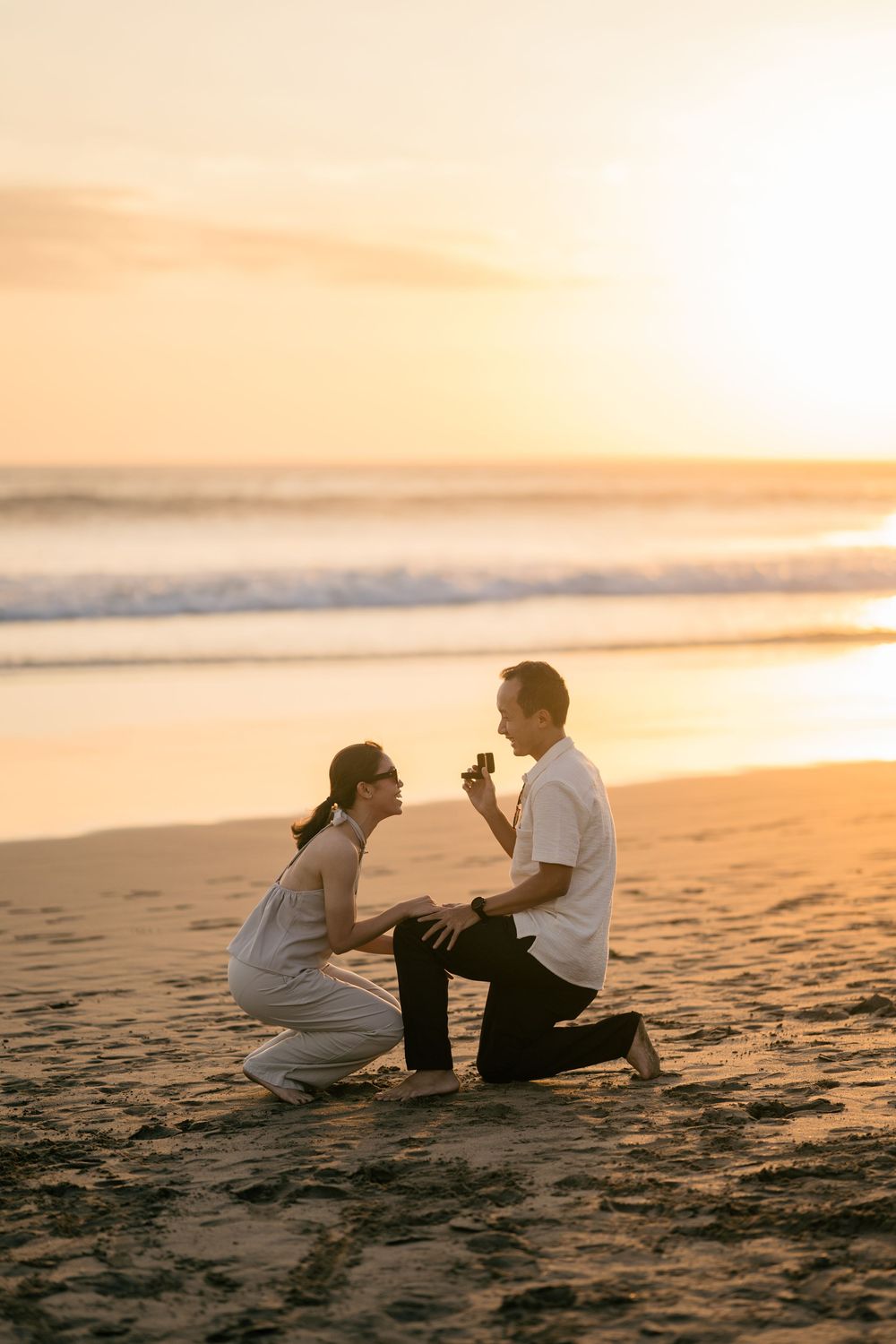 Professional proposal photographer at Petitenget Beach.