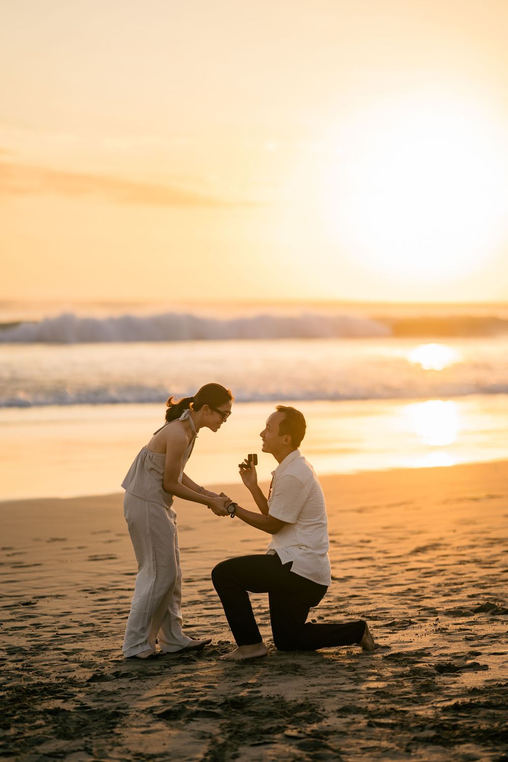 Professional proposal photographer at Petitenget Beach.
