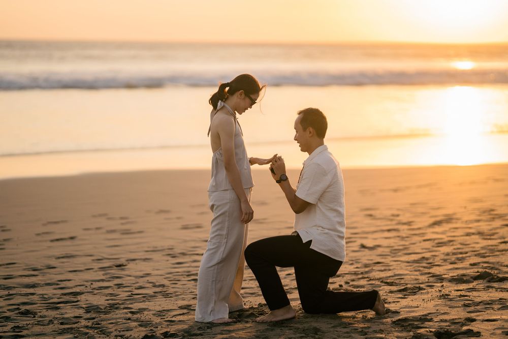 Professional proposal photographer at Petitenget Beach.