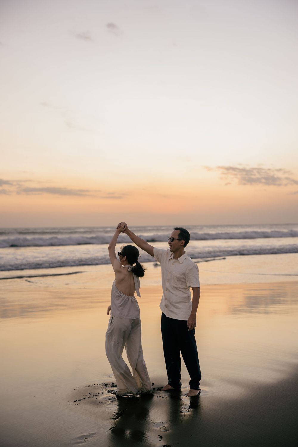 Sunset engagement photography at Petitenget Beach.