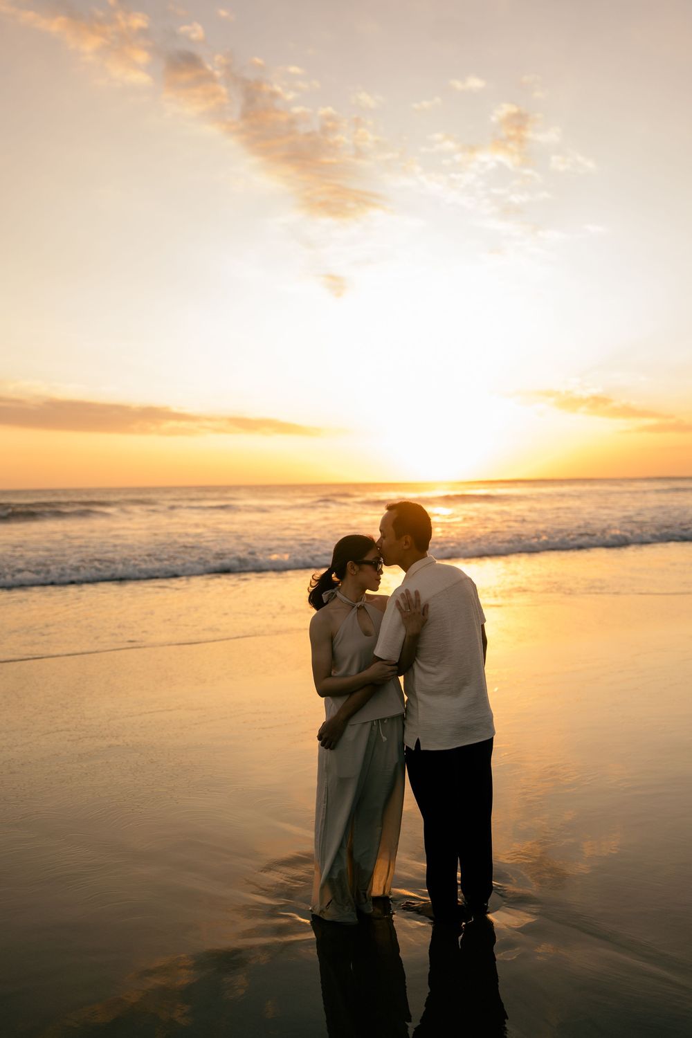 Sunset engagement photography at Petitenget Beach.