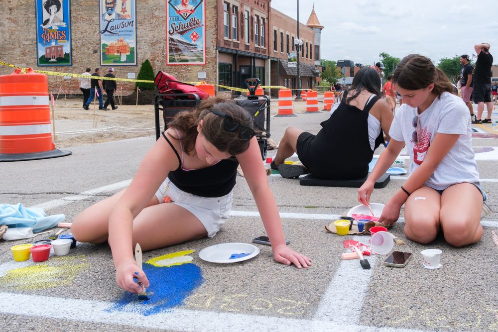 Attendees of Belvidere Heritage Days in Belvidere, IL participate in Paint On State in the downtown area. Saturday, June 27, 2026.