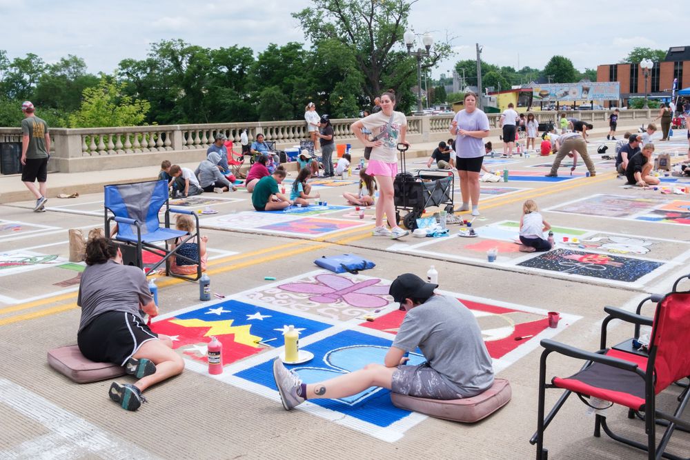Attendees of Belvidere Heritage Days in Belvidere, IL participate in Paint On State in the downtown area. Saturday, June 27, 2026.