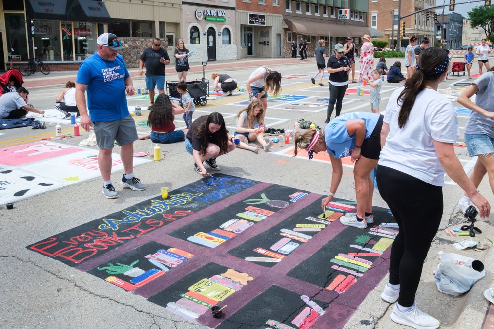 Attendees of Belvidere Heritage Days in Belvidere, IL participate in Paint On State in the downtown area. Saturday, June 27, 2026.