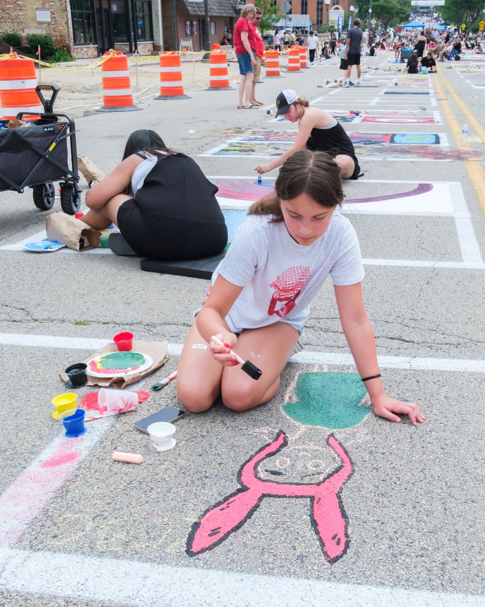 Attendees of Belvidere Heritage Days in Belvidere, IL participate in Paint On State in the downtown area. Saturday, June 27, 2026.