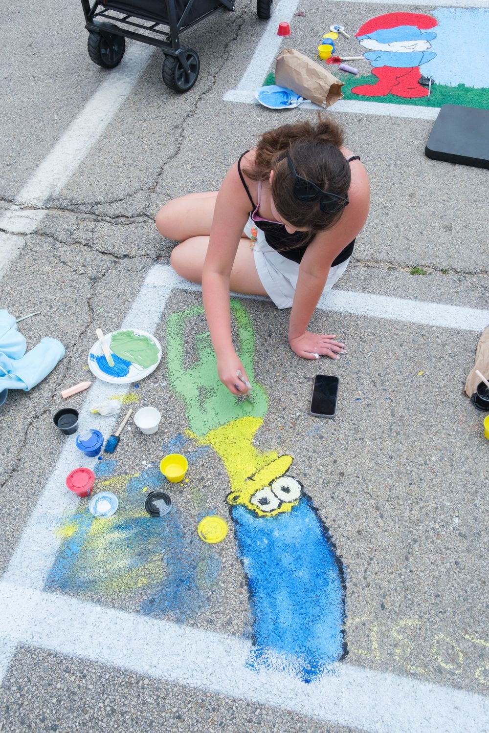 Attendees of Belvidere Heritage Days in Belvidere, IL participate in Paint On State in the downtown area. Saturday, June 27, 2026.