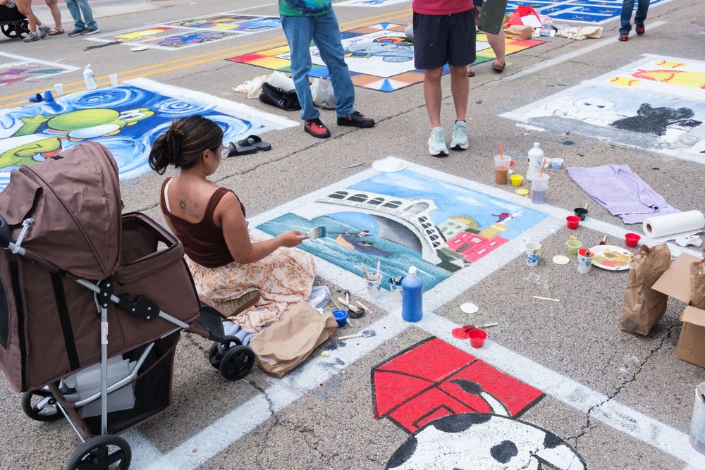 Attendees of Belvidere Heritage Days in Belvidere, IL participate in Paint On State in the downtown area. Saturday, June 27, 2026.