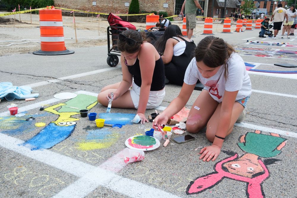 Attendees of Belvidere Heritage Days in Belvidere, IL participate in Paint On State in the downtown area. Saturday, June 27, 2026.