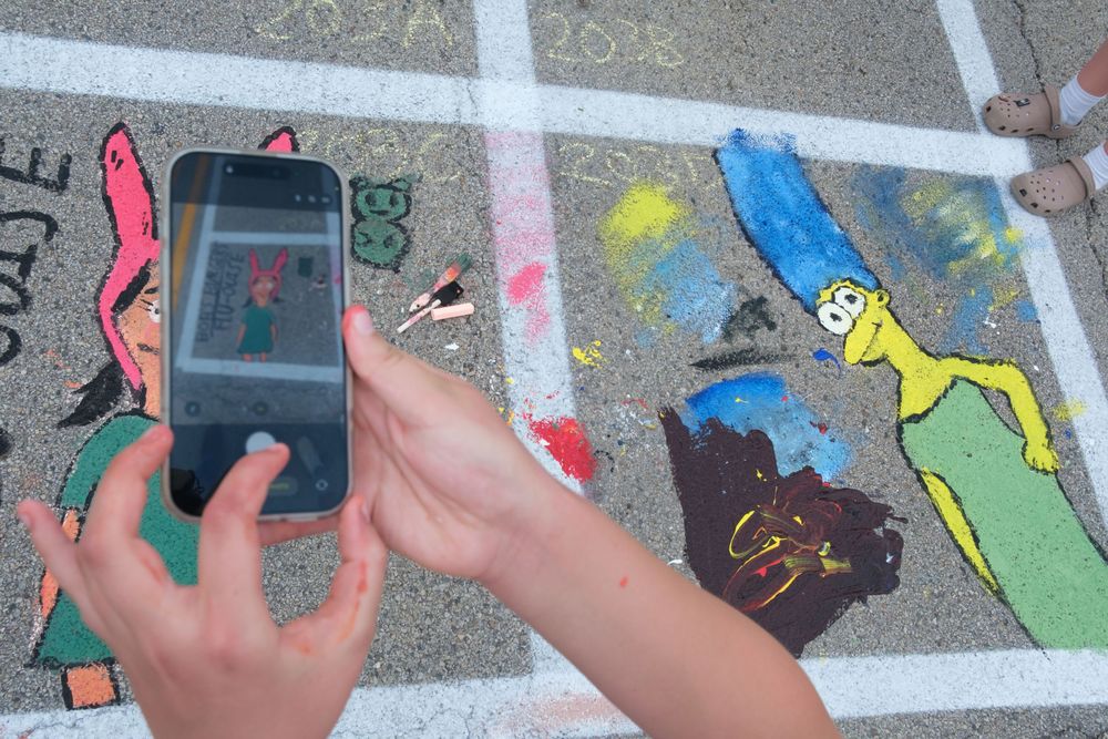 Attendees of Belvidere Heritage Days in Belvidere, IL participate in Paint On State in the downtown area. Saturday, June 27, 2026.