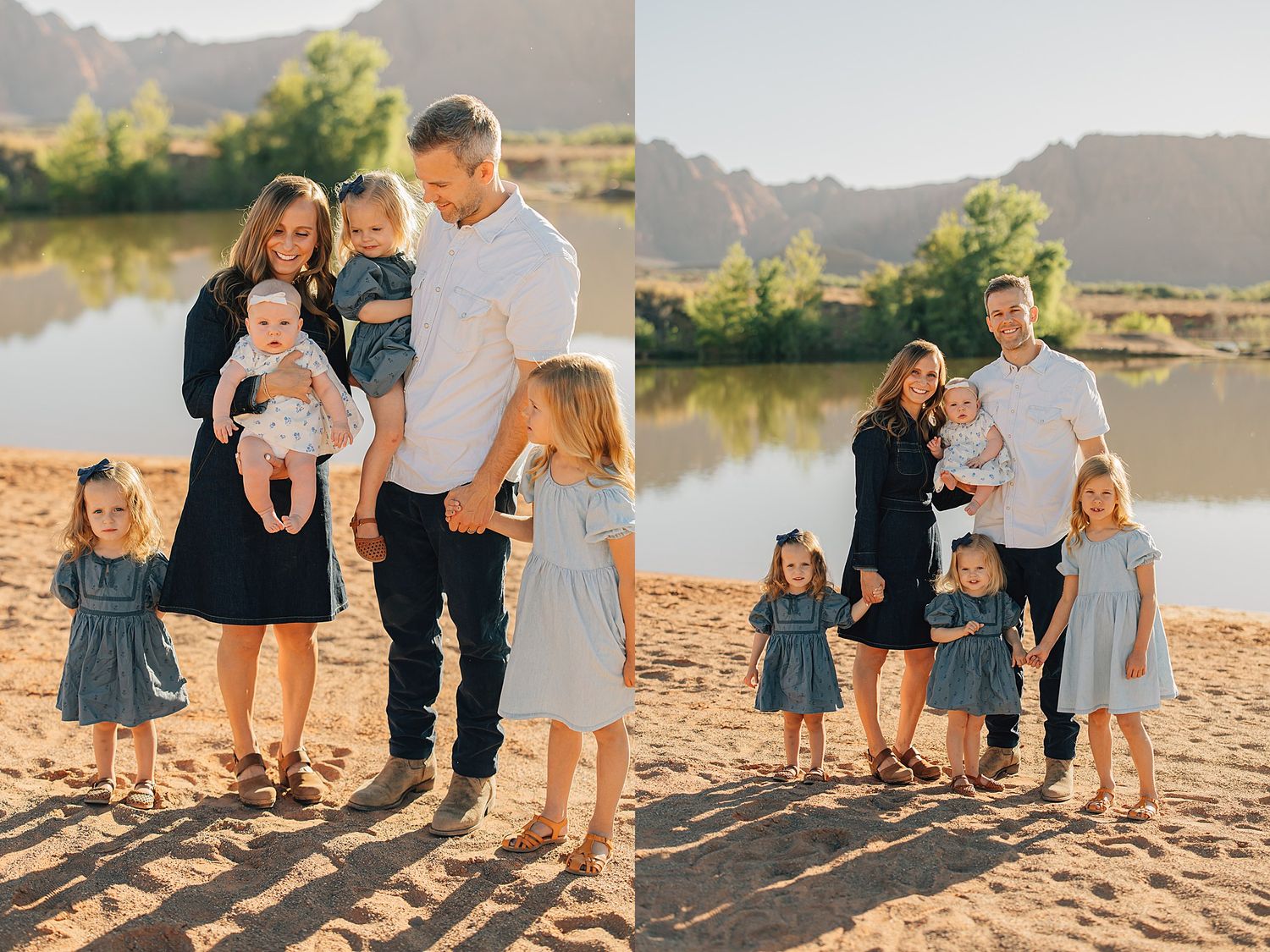 Family portrait on sandy beach with mountains and river, parents holding toddlers, girls in matching blue dresses.