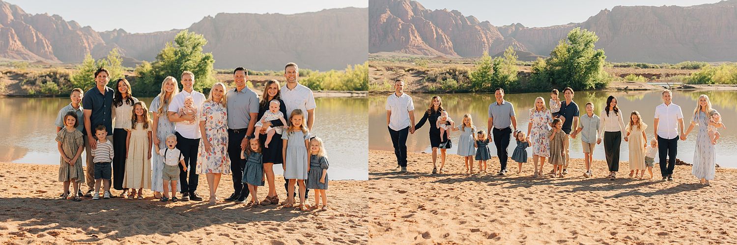 Large extended family posing and walking on sandy riverbank with red rock canyon backdrop during outdoor photo session.
