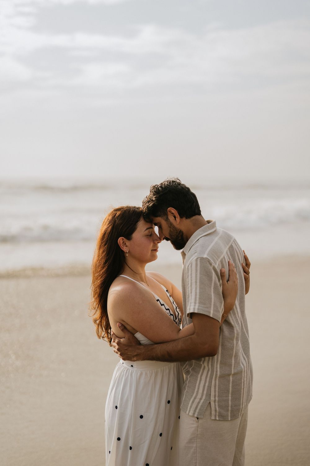 Romantic couple photoshoot on Petitenget Beach in Seminyak.