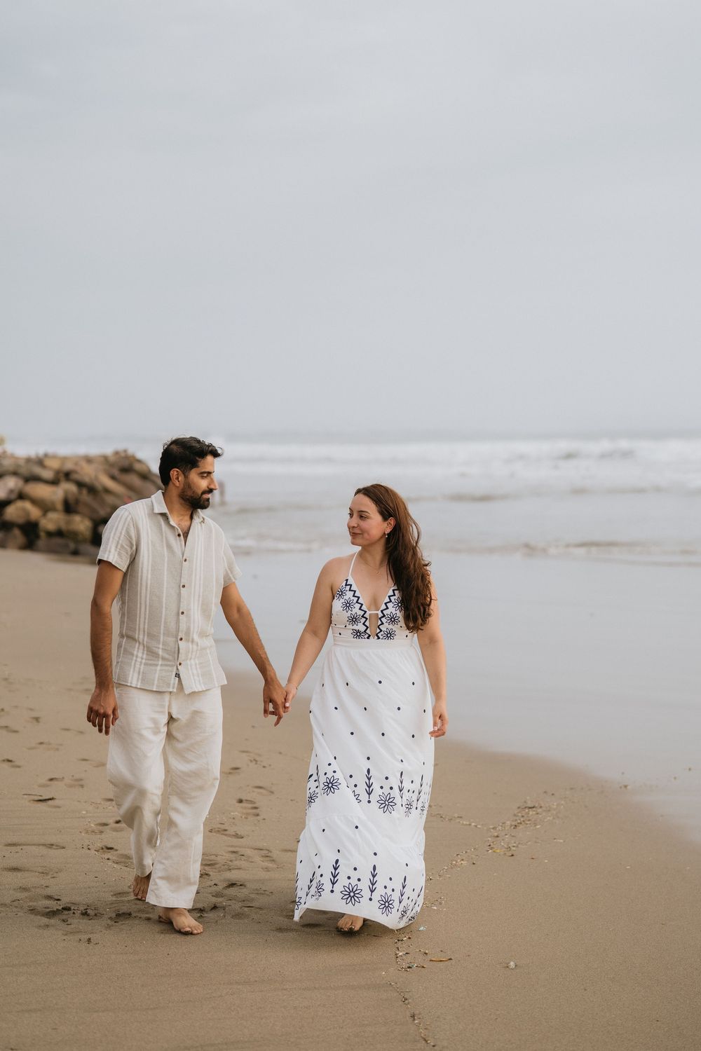 Romantic couple photoshoot on Petitenget Beach in Seminyak.