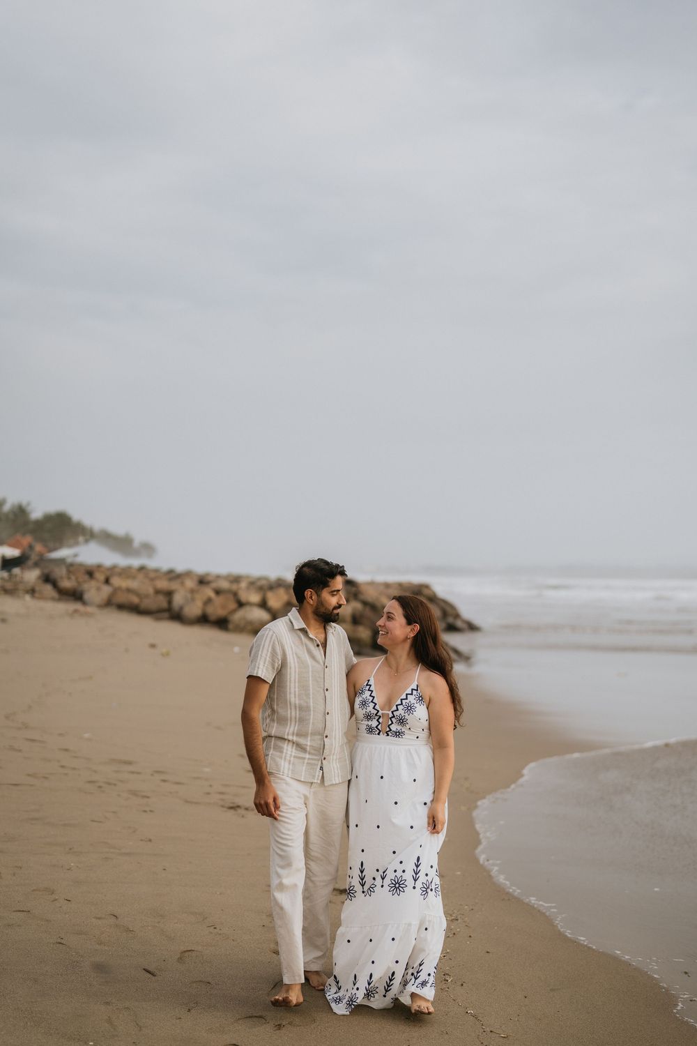 Romantic couple photoshoot on Petitenget Beach in Seminyak.