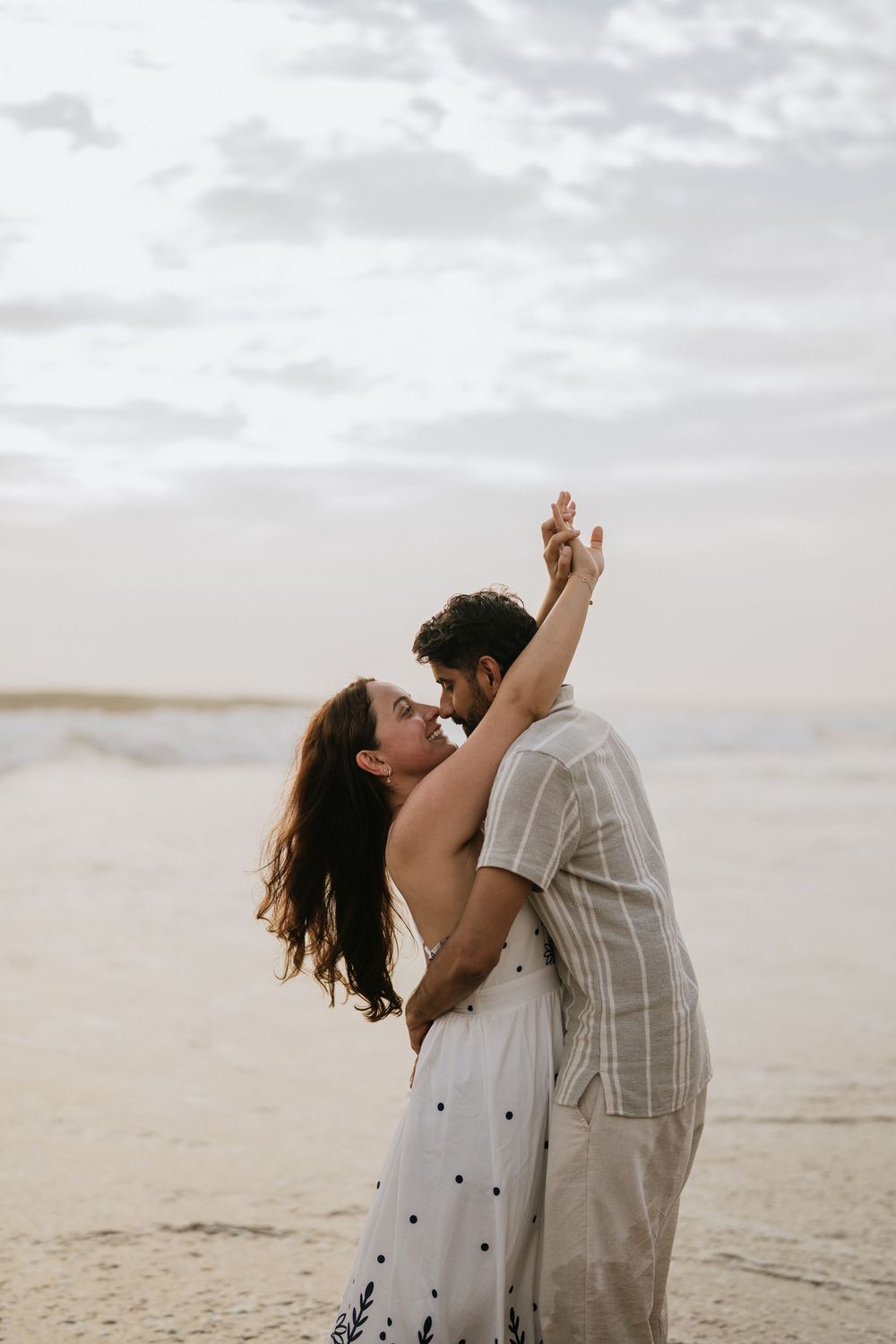 Romantic couple photoshoot on Petitenget Beach in Seminyak.