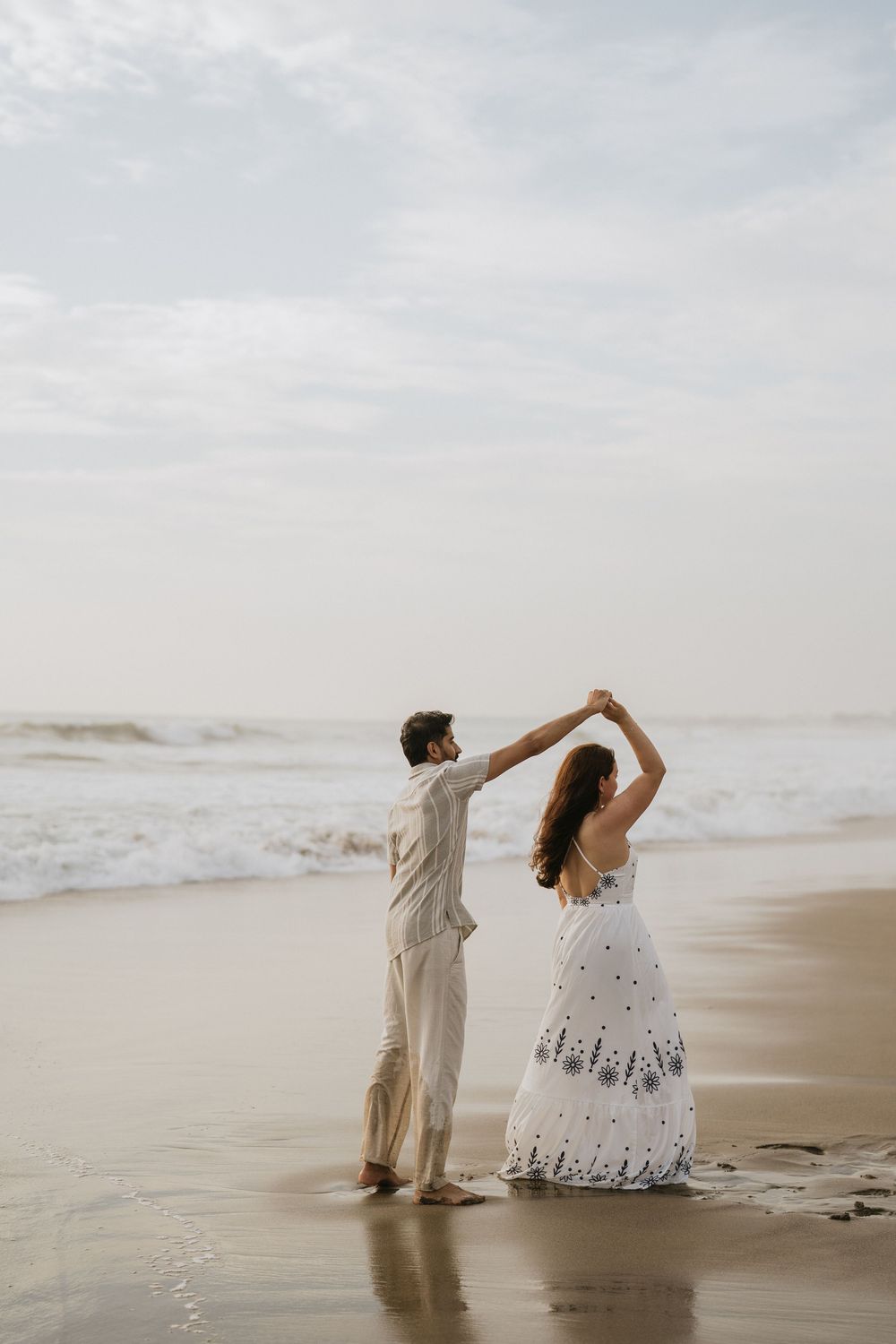 Romantic couple photoshoot on Petitenget Beach in Seminyak.