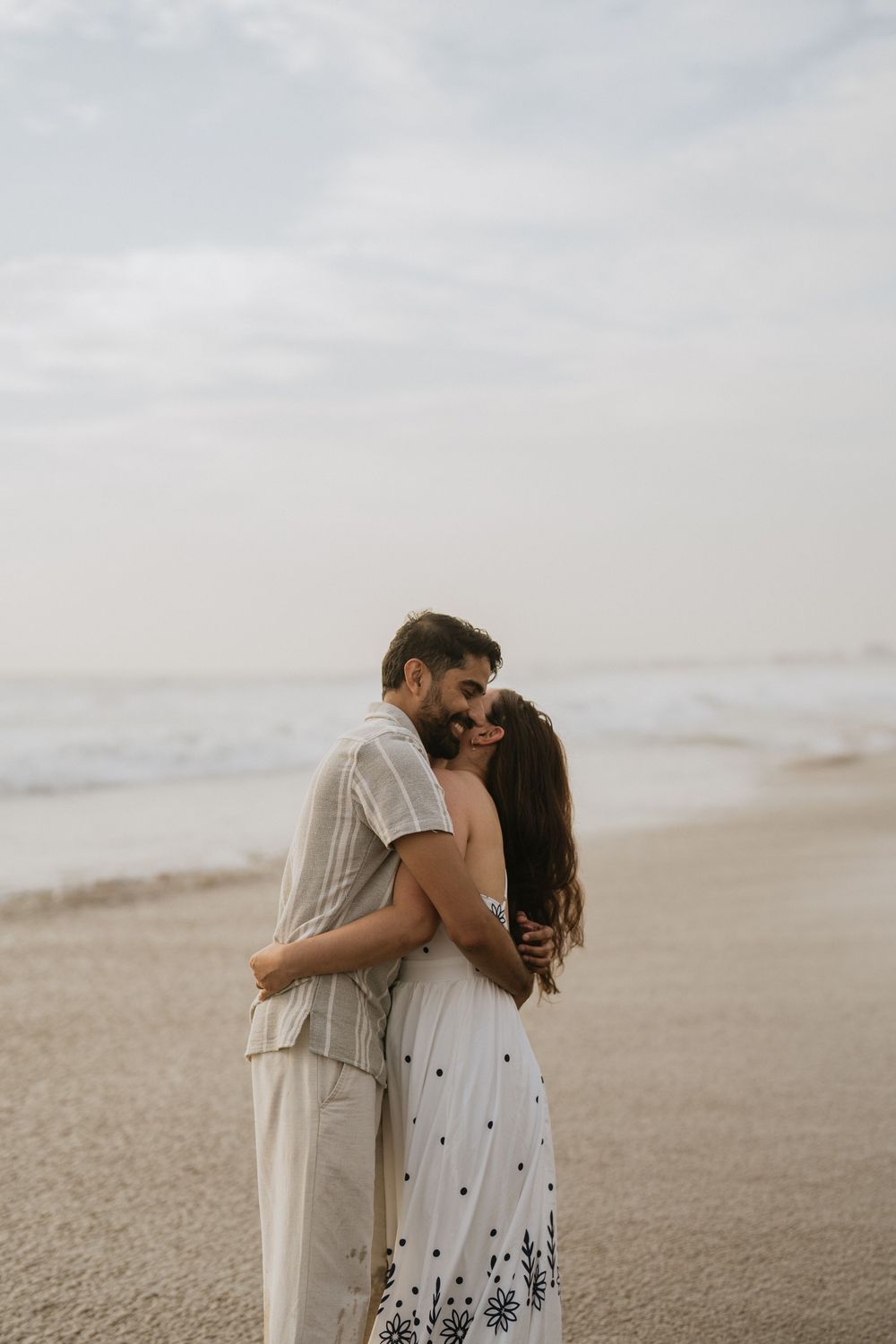 Romantic couple photoshoot on Petitenget Beach in Seminyak.
