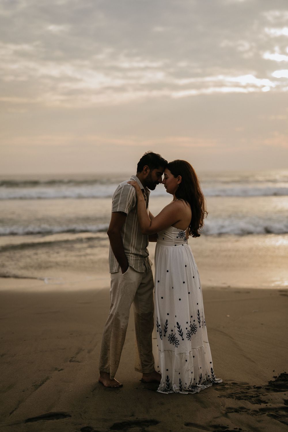 Romantic couple photoshoot on Petitenget Beach in Seminyak.
