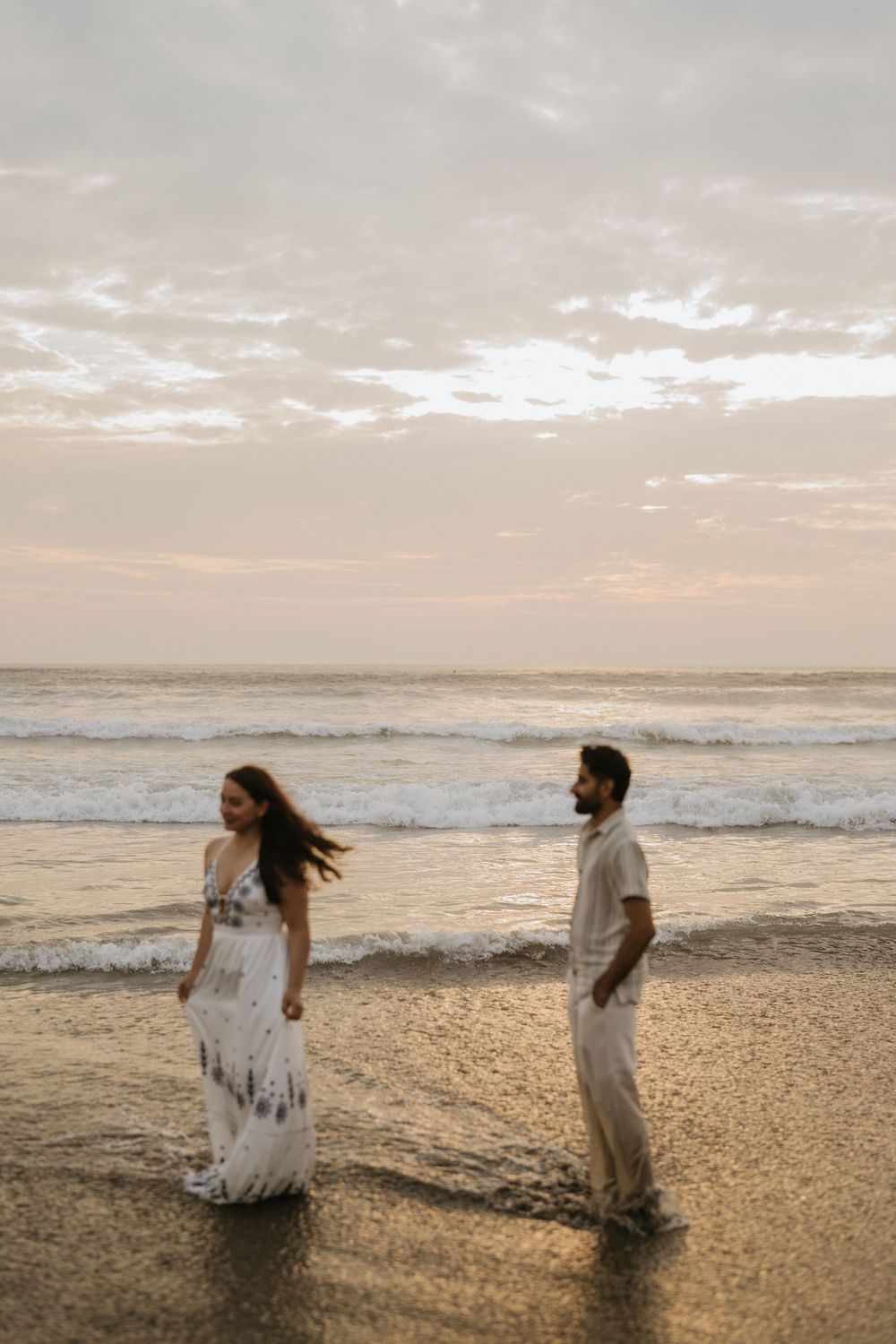 Romantic couple photoshoot on Petitenget Beach in Seminyak.