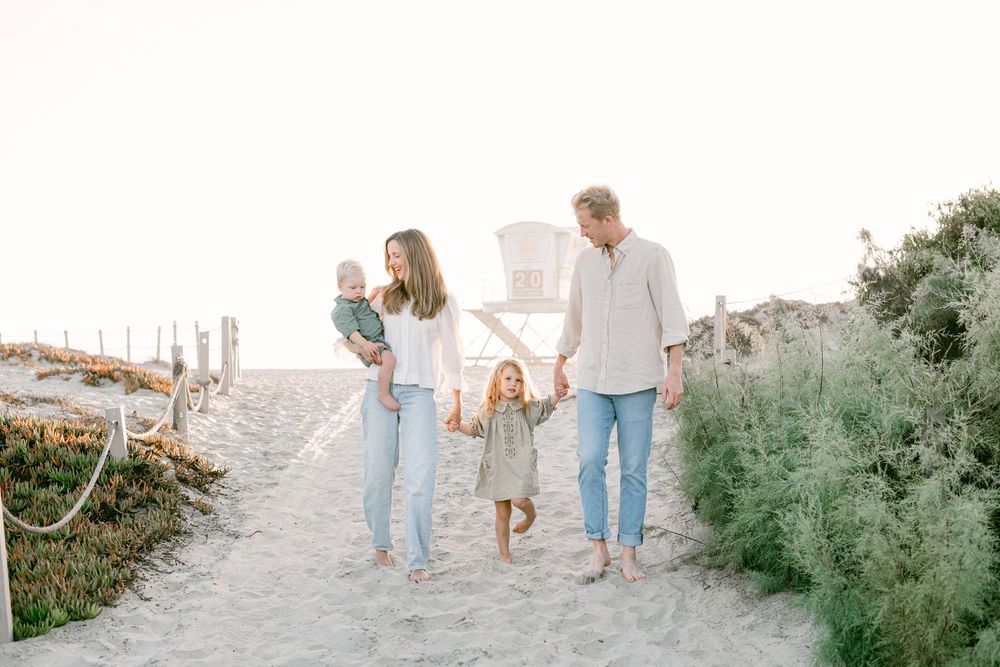 Family with small kids at South Ponto beach in Carlsbad.
