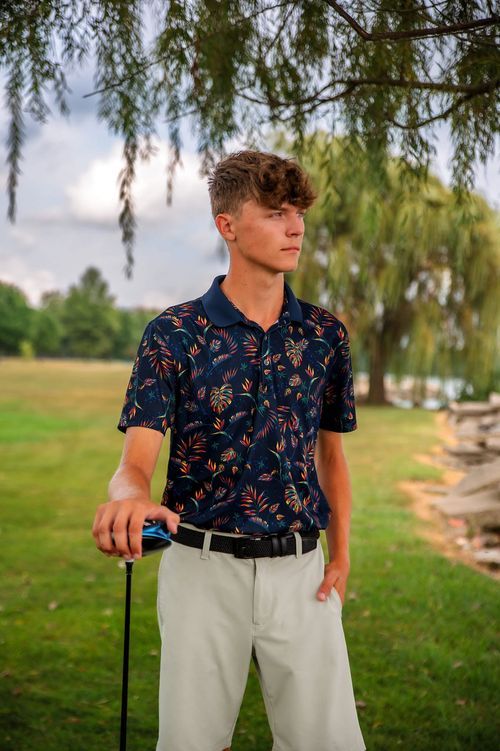 High school senior posing outdoors during a senior photography session in St. Marys, Ohio