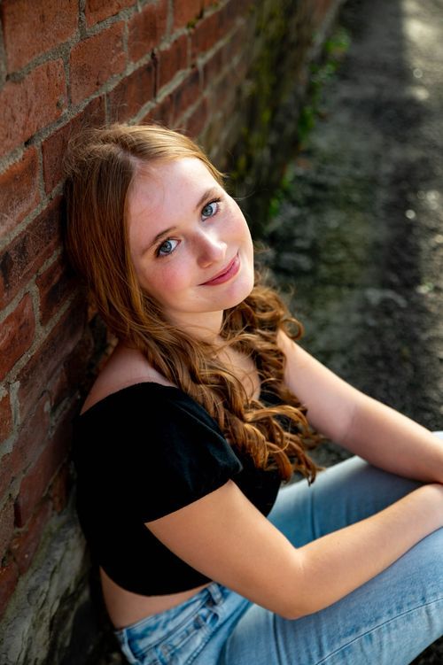 High school senior posing outdoors during a senior photography session in St. Marys, Ohio