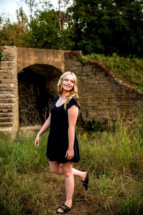 High school senior posing outdoors during a senior photography session in St. Marys, Ohio