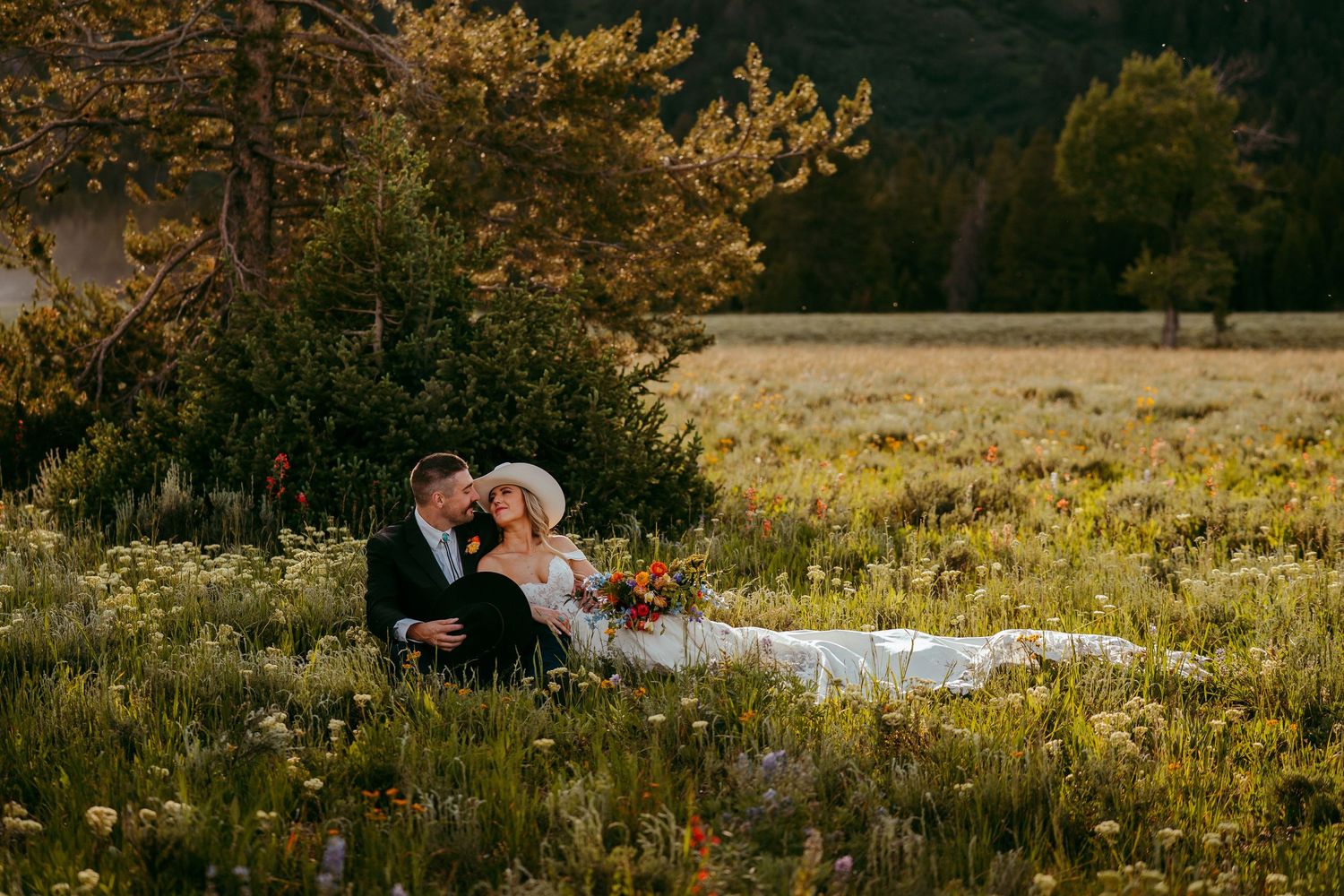 Candid moment between newlyweds during Jackson Hole mountain wedding