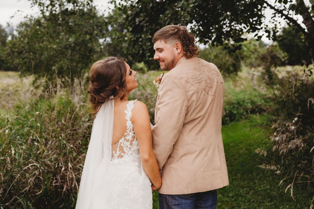 A series of wedding photos showing a couple walking together outdoors with natural greenery in the background.