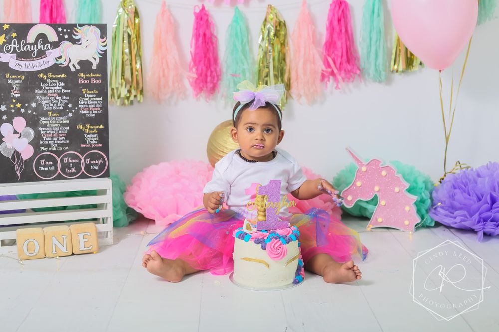 cake smash indoor.  unicorn theme.